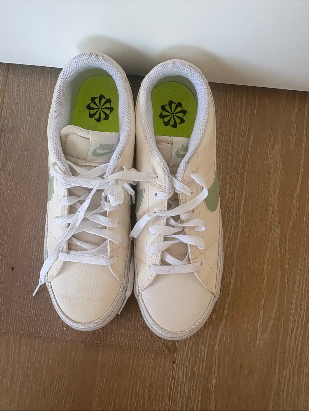 Nike White Low-Top Sneakers with Light Green Accents